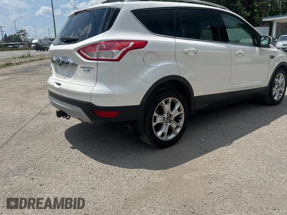 2015 Ford Escape Titanium with VIN 1FMCU9J96FUC83519, listed as a Copart auction lot 65181025 with 199,500 mi miles and Clean title. Bid and sale history available at DreamBid. Image 4.