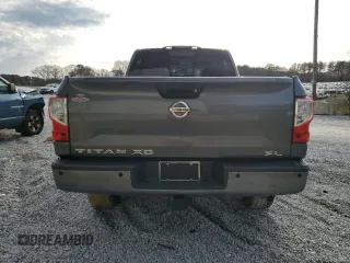 2016 Nissan Titan SL z VIN 1N6BA1F29GN515240, wystawiony jako Copart lot #45185835 z przebiegiem 137 164 mil mil oraz Czysty tytuł • Clean title. Historia ofert i sprzedaży dostępna na DreamBid. Obrazek 6.