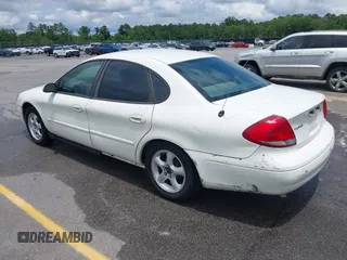 2003 Ford Taurus SE Standard with VIN 1FAFP53U13A192387, listed as a IAAI auction lot 42398723 with 247,077 mi miles and . Bid and sale history available at DreamBid. Image 3.
