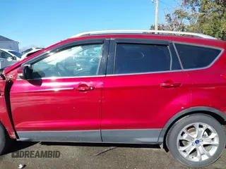 2016 Ford Escape Titanium with VIN 1FMCU0J93GUB01191, listed as a IAAI auction lot 41824183 with 97,241 mi miles. Bid and sale history available at carsss.com. Image 14.