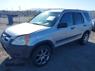 2002 Honda CR-V LX with VIN JHLRD68432C019992, listed as a IAAI auction lot 41963062 with 154,917 mi miles and . Bid and sale history available at carsss.com. Image 2.