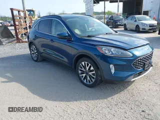 2020 Ford Escape Titanium Hybrid z VIN 1FMCU0DZ9LUA69322, wystawiony jako IAAI lot #42126368 z przebiegiem 71 559 mil mil oraz . Historia ofert i sprzedaży dostępna na DreamBid. Obrazek 1.