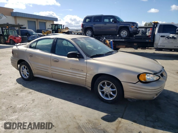 2001 Pontiac Grand Am SE z VIN 1G2NE52T91M583582, wystawiony jako Copart lot #77808974 z przebiegiem 126 219 mil mil oraz Szkoda całkowita • Salvage title. Historia ofert i sprzedaży dostępna na DreamBid. Obrazek 4.