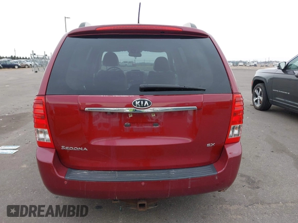 2012 Kia Sedona EX with VIN KNDMH4C76C6463143, listed as a IAAI auction lot 41990970 with 214,045 mi miles. Bid and sale history available at carsss.com. Image 16.