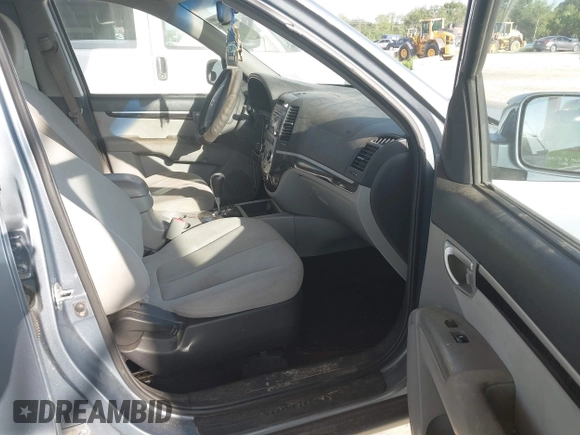 2009 Hyundai Santa Fe SE with VIN 5NMSH73EX9H318027, listed as a IAAI auction lot 42668676 with 185,610 mi miles and . Bid and sale history available at DreamBid. Image 5.