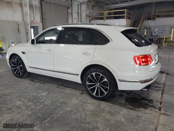 2018 Bentley Bentayga W12 Signature with VIN SJAAC2ZVXJC019209, listed as a Copart auction lot 46196814 with 11865 miles and Salvage Title. Bid and sale history available at carsss.com. Image 2.