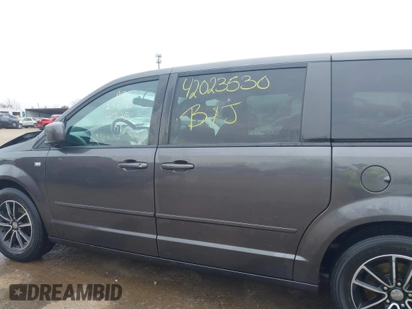 2014 Dodge Grand Caravan SXT with VIN 2C4RDGCG0ER406080, listed as a IAAI auction lot 42023530 with 183,212 mi miles and . Bid and sale history available at DreamBid. Image 15.