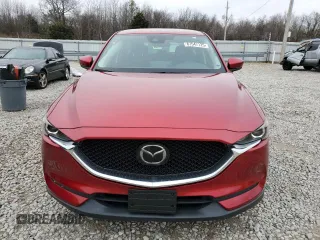 2021 Mazda CX-5 Sport with VIN JM3KFABM7M1304656, listed as a Copart auction lot 87547125 with 72,785 mi miles and Salvage Title. Bid and sale history available at carsss.com. Image 5.