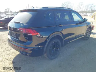 2022 Volkswagen Tiguan SE R-Line Black with VIN 3VVCB7AX1NM084993, listed as a IAAI auction lot 41502738 with 56,559 mi miles. Bid and sale history available at carsss.com. Image 4.