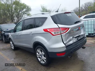 2015 Ford Escape Titanium with VIN 1FMCU9JX2FUA24279, listed as a IAAI auction lot 41930868 with 254,997 mi miles. Bid and sale history available at carsss.com. Image 3.