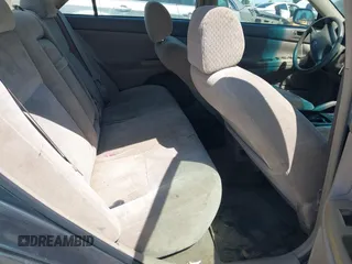 2002 Toyota Camry LE z VIN 4T1BE32K02U587544, wystawiony jako IAAI lot #42291358 z przebiegiem Nie podano mil oraz . Historia ofert i sprzedaży dostępna na DreamBid. Obrazek 8.