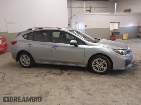 2017 Subaru Impreza Premium z VIN 4S3GTAB63H3705818, wystawiony jako IAAI lot #41568064 z przebiegiem 132 046 mil mil oraz . Historia ofert i sprzedaży dostępna na DreamBid. Obrazek 13.