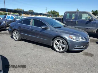 2013 Volkswagen CC R-Line with VIN WVWBP7AN2DE501472, listed as a Copart auction lot 67165124 with 101,033 mi miles and Salvage Title. Bid and sale history available at DreamBid. Image 4.
