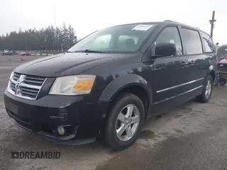 2009 Dodge Grand Caravan SXT with VIN 2D8HN54119R569142, listed as a IAAI auction lot 42000421 with 161,717 mi miles and . Bid and sale history available at DreamBid. Image 2.