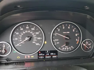 2013 BMW 3 Series 328i with VIN WBA3C1G58DNR48373, listed as a Copart auction lot 60780035 with 234,231 mi miles and Salvage title. Bid and sale history available at DreamBid. Image 9.