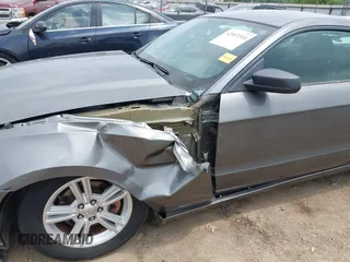 2013 Ford Mustang V6 with VIN 1ZVBP8AM7D5272040, listed as a IAAI auction lot 42407314 with 64,258 mi miles and . Bid and sale history available at DreamBid. Image 6.
