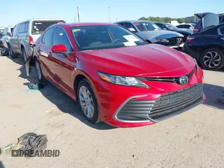 2024 Toyota Camry LE z VIN 4T1C11AK1RU207305, wystawiony jako IAAI lot #41973066 z przebiegiem 19 165 mil mil oraz . Historia ofert i sprzedaży dostępna na DreamBid. Obrazek 1.
