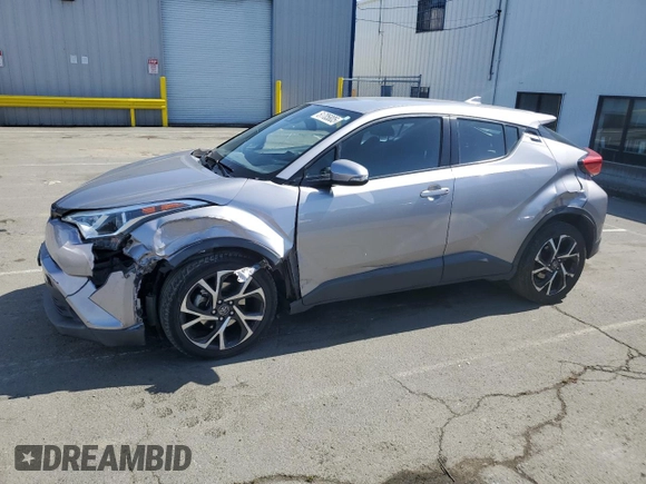 2018 Toyota C-HR XLE with VIN NMTKHMBX6JR047937, listed as a Copart auction lot 51705805 with 128,543 mi miles and Salvage Title. Bid and sale history available at DreamBid. Image 1.
