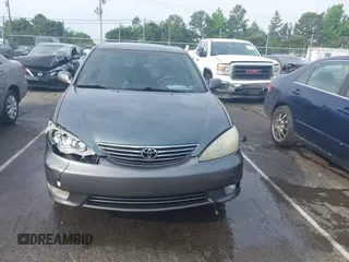2005 Toyota Camry LE z VIN 4T1BF32K85U594470, wystawiony jako IAAI lot #42280442 z przebiegiem 151 553 mil mil oraz . Historia ofert i sprzedaży dostępna na DreamBid. Obrazek 12.