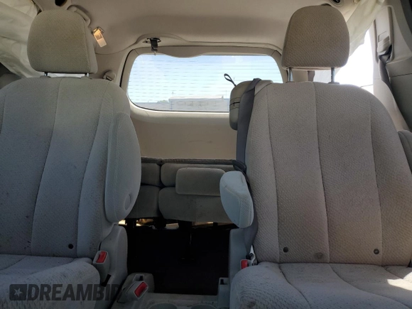 2011 Toyota Sienna LE AAS с VIN 5TDKK3DC4BS046973, выставлен на аукционе Copart как лот 58083875 с пробегом 322 399 миль миль и Списание • Salvage title. История ставок и продаж доступна на DreamBid. Изображение 10.