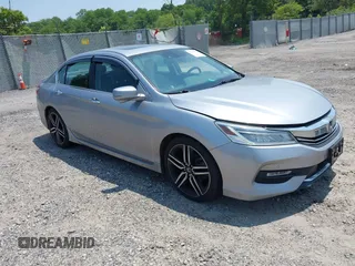 2017 Honda Accord Touring with VIN 1HGCR3F96HA001865, listed as a IAAI auction lot 42424296 with 170,567 mi miles and . Bid and sale history available at DreamBid. Image 1.