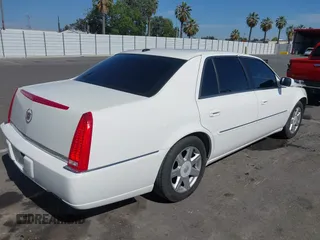 2007 Cadillac DTS Luxury I z VIN 1G6KD57Y77U133267, wystawiony jako IAAI lot #42337188 z przebiegiem 126 063 mil mil oraz . Historia ofert i sprzedaży dostępna na DreamBid. Obrazek 4.