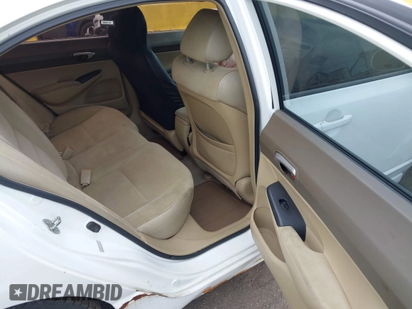 2006 Honda Civic LX with VIN 1HGFA16556L084177, listed as a IAAI auction lot 42053325 with 142,664 mi miles and . Bid and sale history available at DreamBid. Image 8.