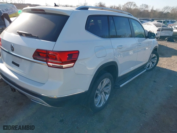 2018 Volkswagen Atlas 3.6L V6 SEL with VIN 1V2MR2CA8JC502440, listed as a IAAI auction lot 41753674 with 142,184 mi miles. Bid and sale history available at carsss.com. Image 4.