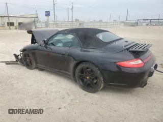 2009 Porsche 911 Carrera S with VIN WP0CB29959S755831, listed as a Copart auction lot 47064005 with 114,522 mi miles and Salvage title. Bid and sale history available at DreamBid. Image 2.