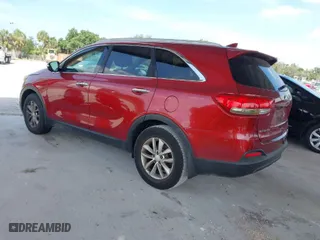 2016 Kia Sorento LX with VIN 5XYPG4A39GG090599, listed as a IAAI auction lot 42096430 with 126,595 mi miles. Bid and sale history available at carsss.com. Image 3.