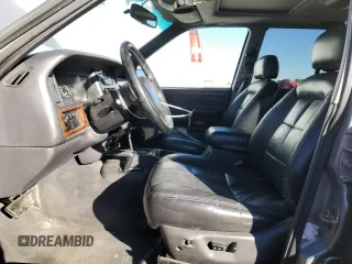 1997 Jeep Grand Cherokee Limited with VIN 1J4GZ78Y4VC568288, listed as a Copart auction lot 88265025 with 185,015 mi miles and Salvage Title. Bid and sale history available at carsss.com. Image 7.