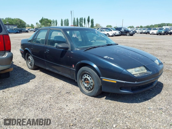 1994 Saturn SL z VIN 1G8ZJ557XRZ269410, wystawiony jako IAAI lot #31653894 z przebiegiem 132 202 mil mil oraz . Historia ofert i sprzedaży dostępna na DreamBid. Obrazek 1.