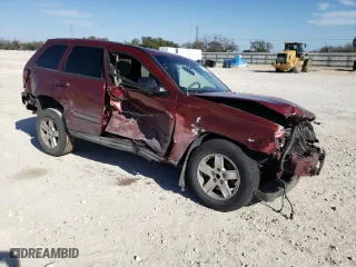 2007 Jeep Grand Cherokee Laredo with VIN 1J8GS48K97C653353, listed as a Copart auction lot 47216485 with 204,609 mi miles and Salvage Title. Bid and sale history available at carsss.com. Image 4.