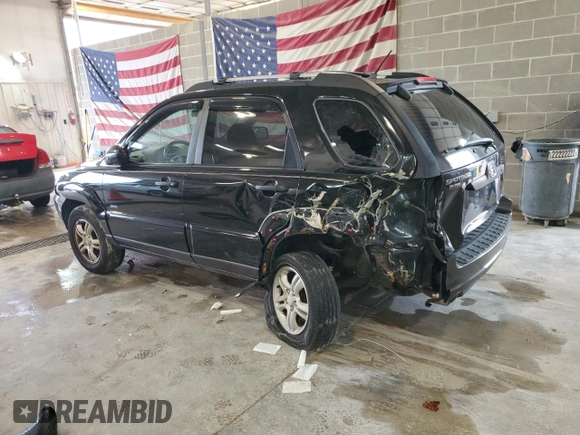 2005 Kia Sportage LX with VIN KNDJE723X57131795, listed as a Copart auction lot 79035214 with 146,746 mi miles and Salvage Title. Bid and sale history available at carsss.com. Image 2.