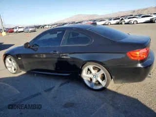 2012 BMW 3 Series 335i with VIN WBAKG7C5XCE803150, listed as a Copart auction lot 76390994 with 113,731 mi miles and Salvage Title. Bid and sale history available at carsss.com. Image 2.