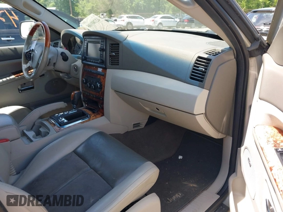 2007 Jeep Grand Cherokee Overland with VIN 1J8HR68227C667400, listed as a IAAI auction lot 42280108 with 115,878 mi miles and . Bid and sale history available at DreamBid. Image 5.