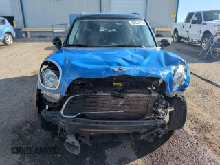 2012 MINI Countryman S with VIN WMWZC3C57CWL80976, listed as a Copart auction lot 50023105 with 74,504 mi miles and Salvage Title. Bid and sale history available at DreamBid. Image 5.