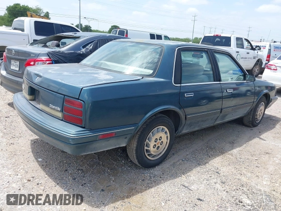 1996 Oldsmobile Cutlass Ciera 1SA VX5 z VIN 1G3AJ55M5T6418193, wystawiony jako IAAI lot #42361441 z przebiegiem 193 675 mil mil oraz . Historia ofert i sprzedaży dostępna na DreamBid. Obrazek 4.