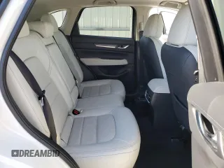 2021 Mazda CX-5 Grand Touring with VIN JM3KFBDM3M1305807, listed as a Copart auction lot 42713655 with 58,162 mi miles and Salvage Title. Bid and sale history available at DreamBid. Image 12.