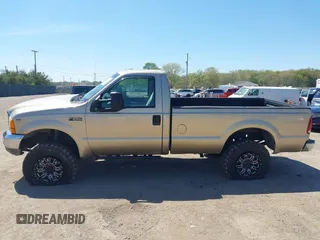2001 Ford F-250 XL z VIN 1FTNF21L91EC17897, wystawiony jako IAAI lot #42216133 z przebiegiem 220 682 mil mil oraz . Historia ofert i sprzedaży dostępna na DreamBid. Obrazek 14.