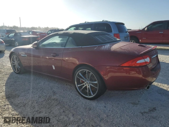2013 Jaguar XK with VIN SAJWA4GB9DLB51059, listed as a Copart auction lot 77322014 with Not Provided miles and Salvage Title. Bid and sale history available at carsss.com. Image 2.