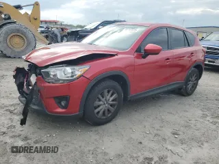 2014 Mazda CX-5 Touring with VIN JM3KE2CY2E0427041, listed as a Copart auction lot 55202375 with 103,167 mi miles and Salvage title. Bid and sale history available at DreamBid. Image 1.