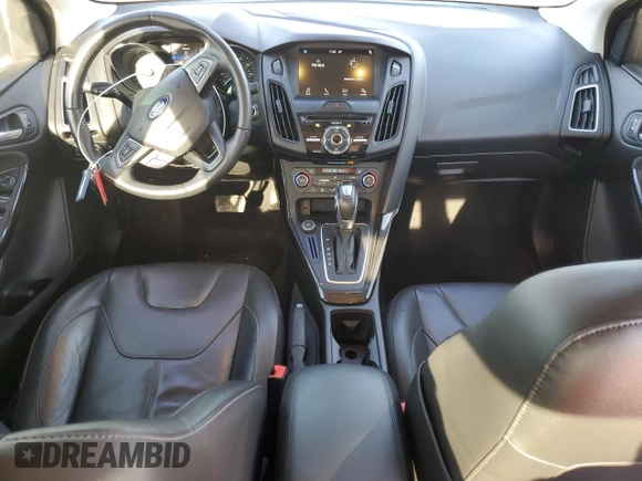 2016 Ford Focus Titanium with VIN 1FADP3J22GL201721, listed as a Copart auction lot 50633795 with 29,801 mi miles and Salvage title. Bid and sale history available at DreamBid. Image 8.