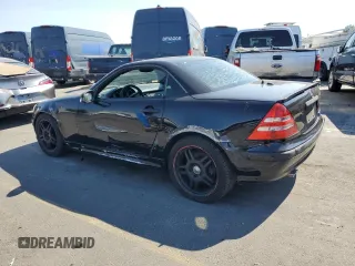 2001 Mercedes-Benz SLK-Class with VIN WDBKK65F71F175734, listed as a Copart auction lot 61874984 with 185,408 mi miles and Salvage Title. Bid and sale history available at carsss.com. Image 2.