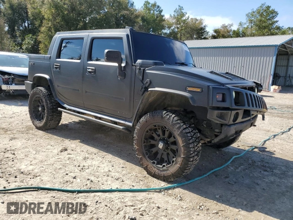 2006 Hummer H2 with VIN 5GRGN22U66H103993, listed as a Copart auction lot 43973375 with 145,565 mi miles and Salvage Title. Bid and sale history available at carsss.com. Image 4.