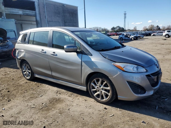 2012 Mazda Mazda5 Touring with VIN JM1CW2CLXC0129834, listed as a Copart auction lot 83216334 with 111,802 mi miles and Salvage Title. Bid and sale history available at carsss.com. Image 4.