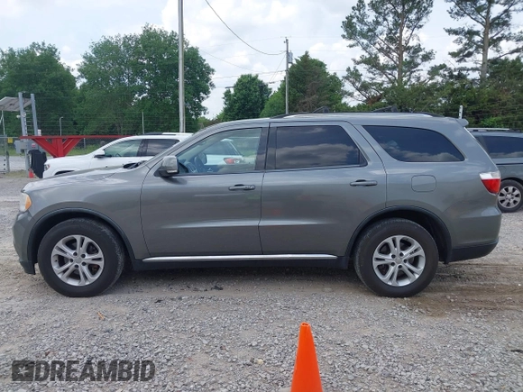 2012 Dodge Durango Crew with VIN 1C4RDJDG7CC112628, listed as a IAAI auction lot 42167214 with 144,898 mi miles and . Bid and sale history available at carsss.com. Image 14.