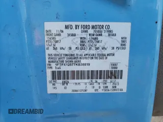 2007 Ford F-150 XLT with VIN 1FTPX12577KB38819, listed as a Copart auction lot 74726934 with 313,485 mi miles and Salvage Title. Bid and sale history available at carsss.com. Image 12.