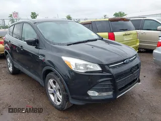 2015 Ford Escape SE with VIN 1FMCU9GX5FUB01864, listed as a IAAI auction lot 42199405 with 114,776 mi miles and . Bid and sale history available at DreamBid. Image 1.
