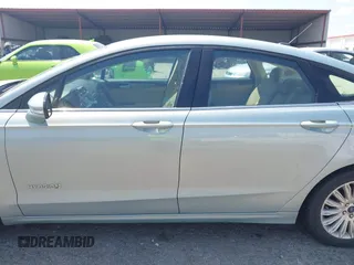 2014 Ford Fusion SE Hybrid with VIN 3FA6P0LU8ER251057, listed as a IAAI auction lot 42150589 with 188,192 mi miles and . Bid and sale history available at DreamBid. Image 14.